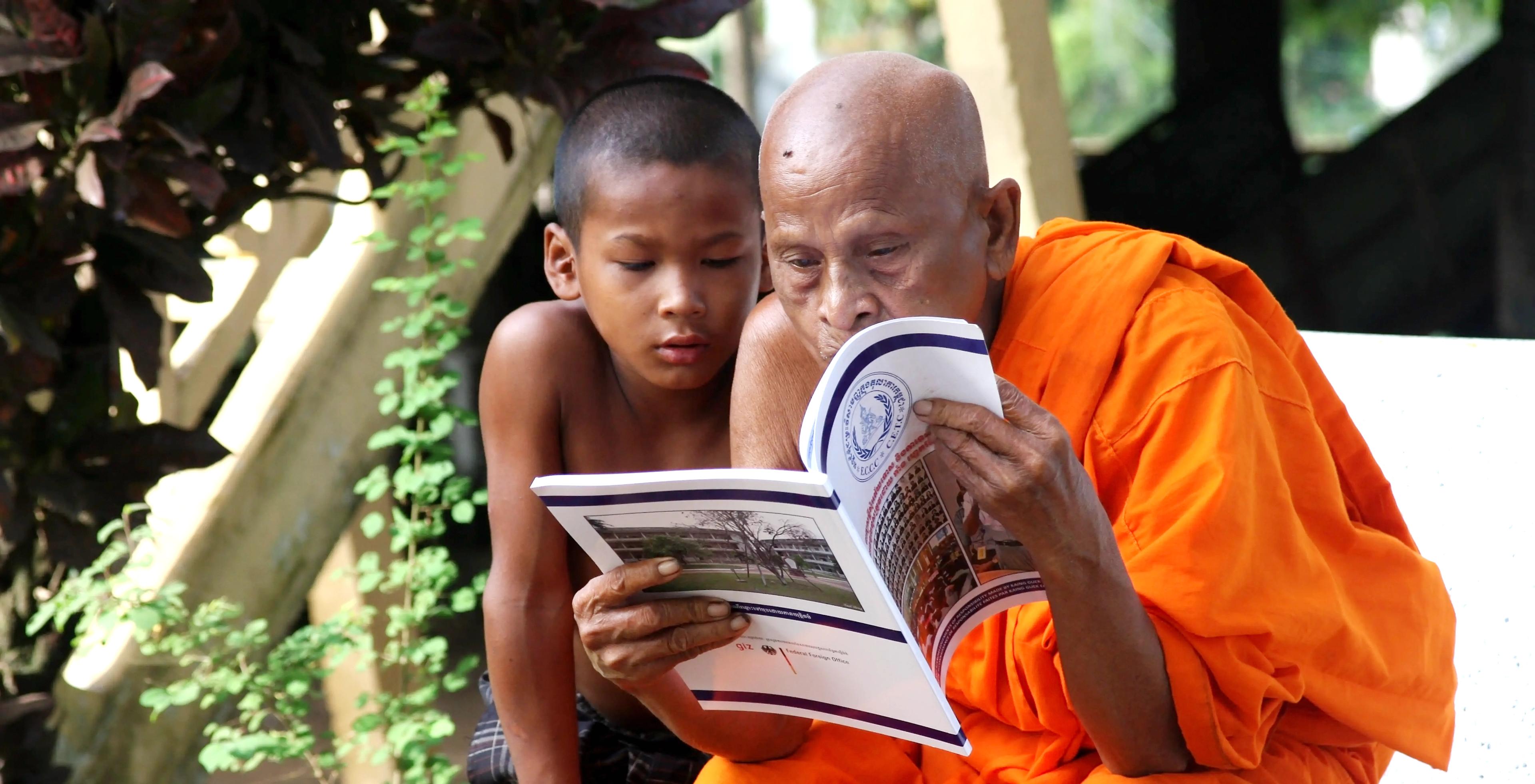 Monk reading the eccc book